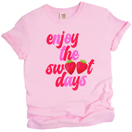 Enjoy the Sweet Days t-shirt in pink, retro distressed lettering with strawberry detail replacing letters, cute summer graphic tee.