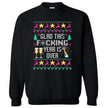 Black New Year ugly sweater sweatshirt featuring ‘Glad This F*cking Year Is Over’ in knitted-look lettering with snowflake symbol, champagne bottle, reindeer, and festive star details.
