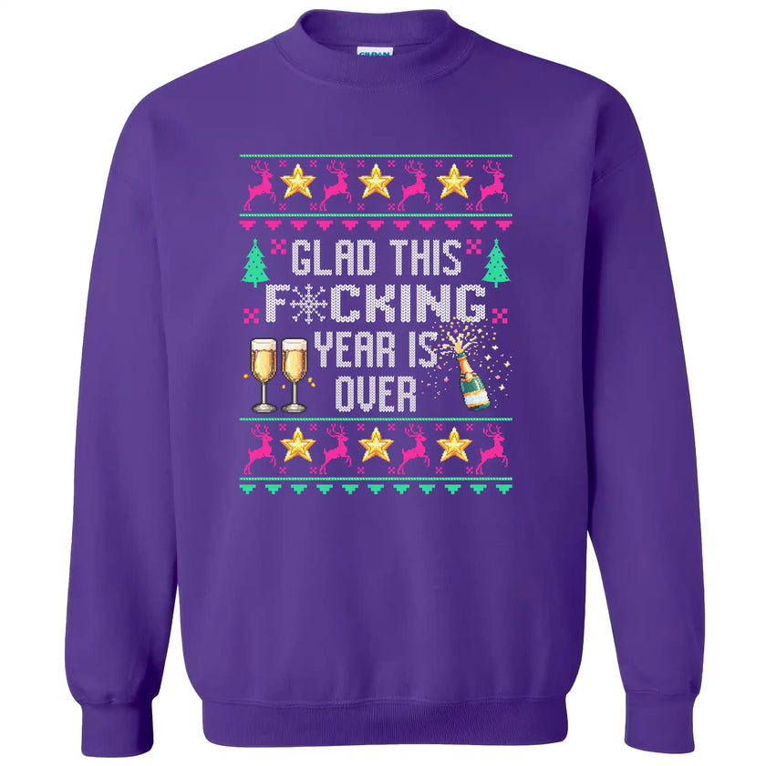 Purple funny New Year sweatshirt with ‘Glad This F*cking Year Is Over’ ugly sweater style design featuring knitted lettering, champagne bottle, reindeer, and sparkling stars.