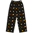 Flat lay of black Buffalo Halloween lounge pants featuring unique candy corn themed pattern with orange yellow white buffaloes, candy corns, stars, moons, and dots.