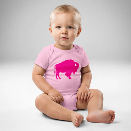 Baby wearing pink Buffalo baby bodysuit featuring large hot pink buffalo silhouette graphic, front view cute Buffalo themed baby outfit.