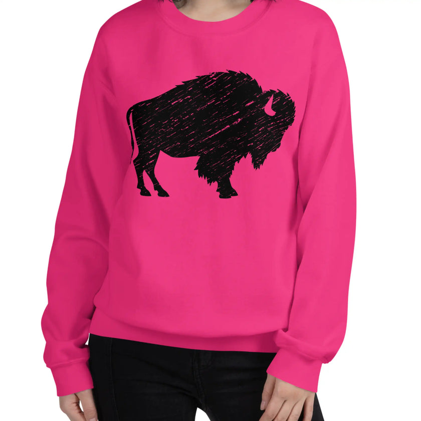 Woman wearing a hot pink Buffalo NY sweatshirt with a large distressed black buffalo silhouette, bold and feminine hometown fashion.