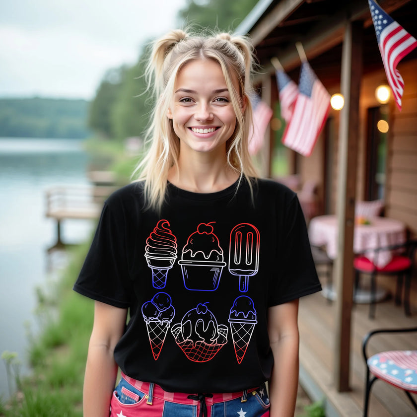 Female model wearing black patriotic ice cream t-shirt, six popsicles in red white blue gradient outline design, festive 4th of July summer outfit.