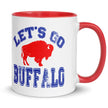 White ceramic coffee mug with Buffalo football themed distressed design wrapping around side, visible blue text and red buffalo graphic