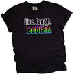 Cute ‘Live Laugh Lesbian’ t-shirt in black, vintage-style lettering with rainbow accent word ‘lesbian,’ playful Pride graphic tee.