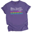 Cute Pride t-shirt in purple, ‘Live Laugh Lesbian’ retro design with rainbow gradient word detail, playful LGBTQ graphic tee.