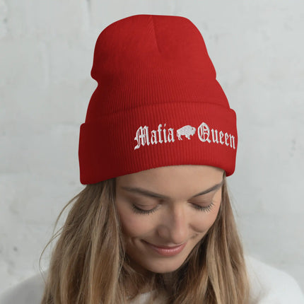 Woman wearing a red cuffed Buffalo football beanie embroidered with white ‘Mafia Queen’ lettering and a small Buffalo silhouette, stylish winter fan accessory.