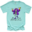 Mint “It’s Giving Mid-Life Crisis” t-shirt flat lay featuring skeleton dancing with tropical drinks, fun sarcastic milestone birthday design