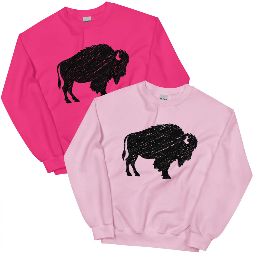 Hot pink and light pink Buffalo NY sweatshirts displayed together, each featuring a large black distressed buffalo silhouette for bold hometown pride style.