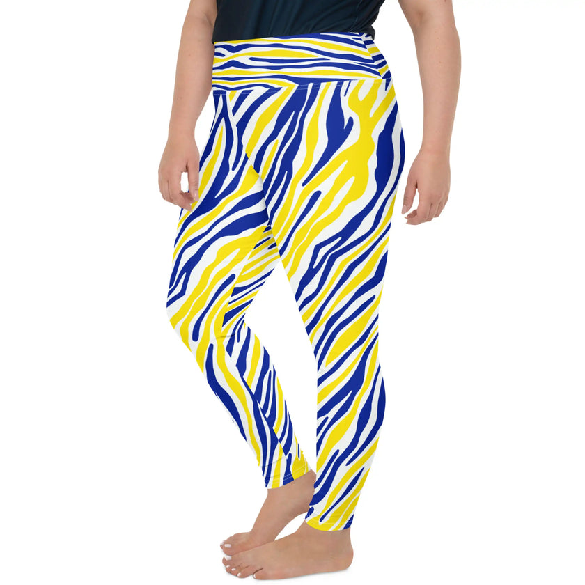 Left side view of plus size high-waisted hockey leggings displaying the original Buffalo stripe design in eye-catching blue and gold colors.