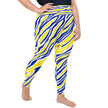 Woman posing in extended-size women's plus Buffalo hockey leggings with colorful blue and gold stripes, demonstrating flexible movement and comfortable activewear styling.
