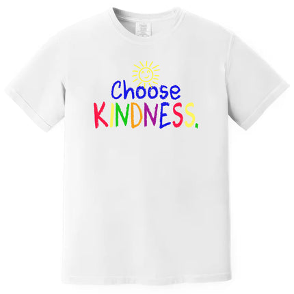 White “Choose Kindness” t-shirt flat lay with bright rainbow crayon lettering and smiling sun graphic for a fun, positive vibe