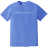 Blue “Protect Your Peace” t-shirt flat lay showcasing minimalist script lettering and peace symbols for easygoing style