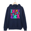 Navy “In My Slow Growth Era” hoodie with bold neon retro lettering, uplifting message for women focused on growth at their own pace