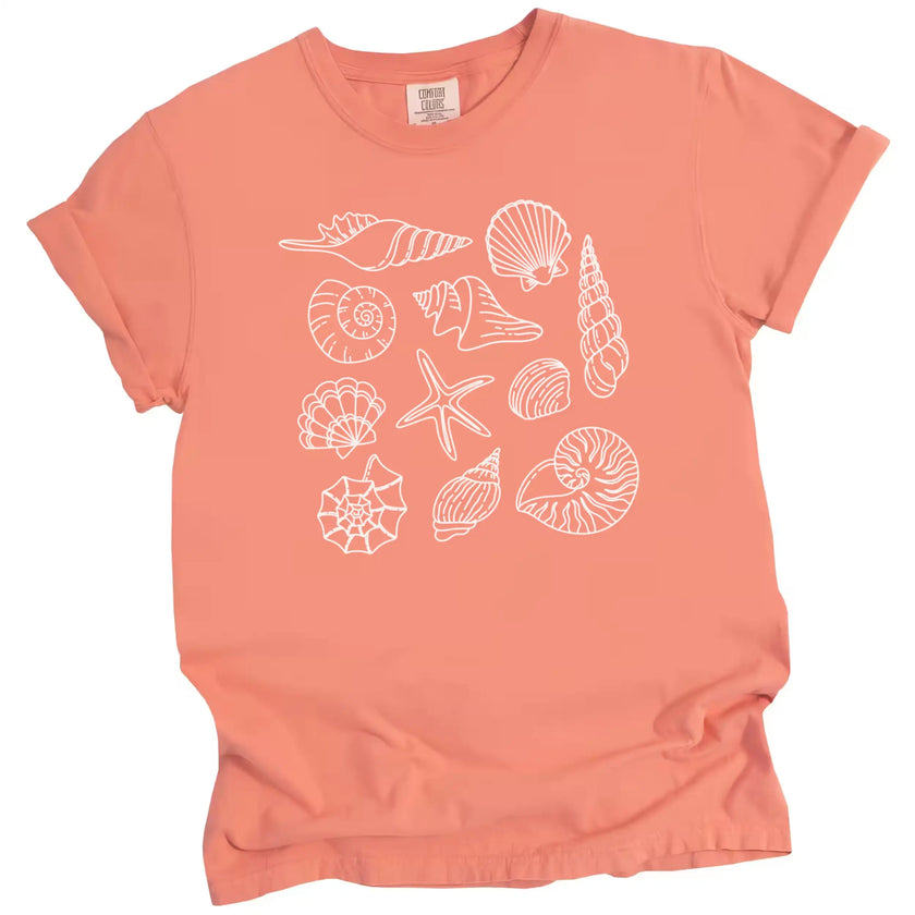 Seashell summer t-shirt in orange, featuring multiple ocean shell varieties arranged in a bright coastal minimalist beach design.