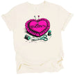 Sewciopath sewing t-shirt in cream, heart pincushion with pins and thread tools, funny crafting pun graphic tee.