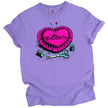 Crafting humor t-shirt in purple, pink pincushion with pins and sewing tools, ‘Sewciopath’ funny sewing design