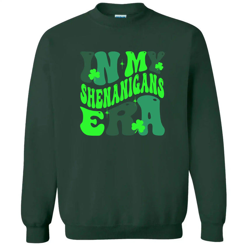 Green “In My Shenanigans Era” St. Patrick’s Day sweatshirt flat lay with cute font and shamrocks, perfect for parades, pubs, or festive lounging