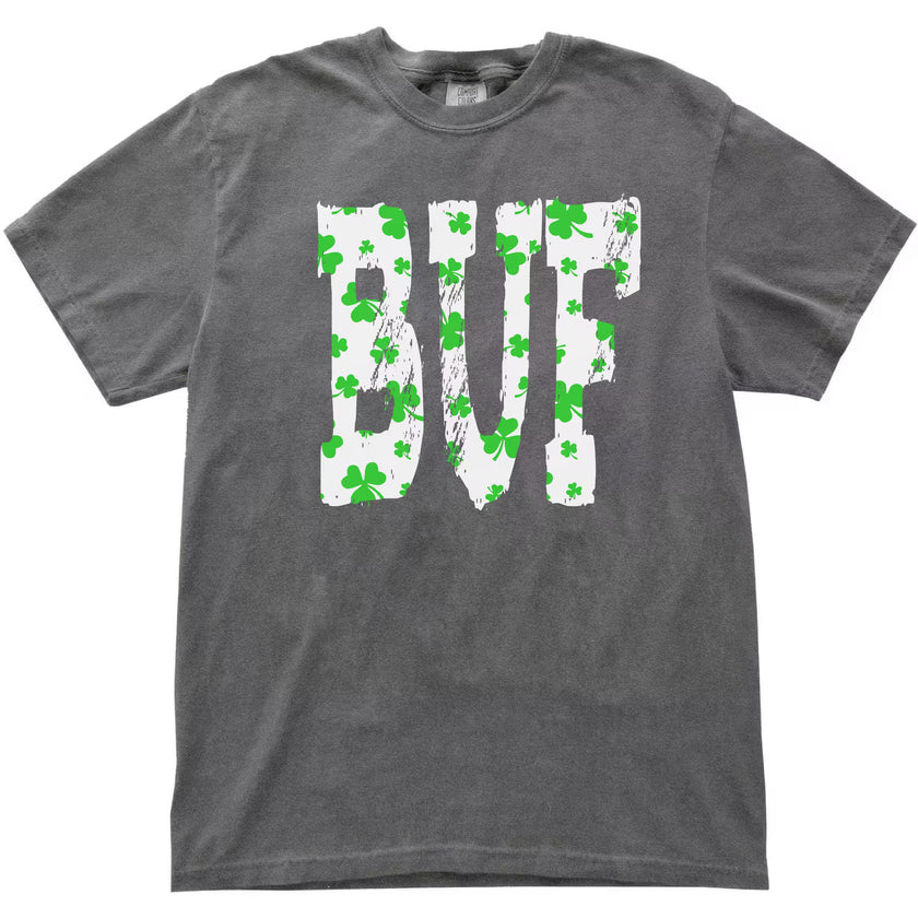 Gray BUF St. Patrick’s Day t-shirt flat lay featuring white block letters filled with green shamrocks for a festive look