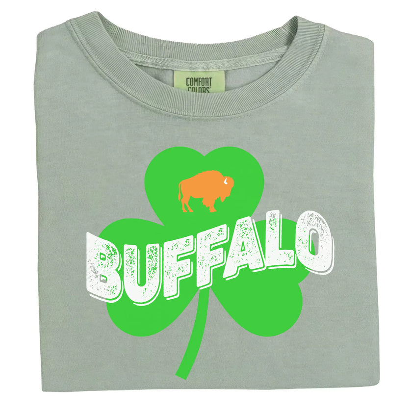 Light green Buffalo Irish St. Patrick’s Day t-shirt flat lay highlighting distressed “Buffalo” lettering, shamrock graphic, and festive orange buffalo