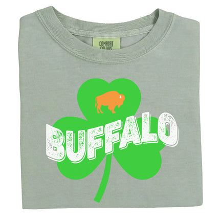 Light green Buffalo Irish St. Patrick’s Day t-shirt flat lay highlighting distressed “Buffalo” lettering, shamrock graphic, and festive orange buffalo