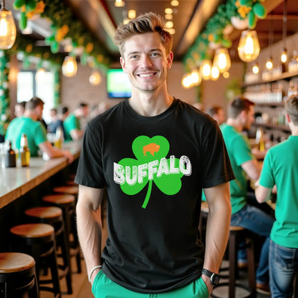 Male model wearing black Buffalo Irish St. Patrick’s Day t-shirt standing at a bar celebrating St. Patrick’s Day