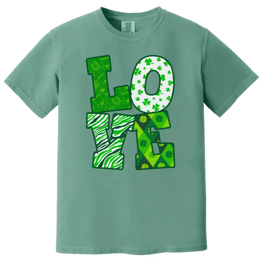 Green St. Patrick’s Day LOVE t-shirt flat lay showcasing bold holiday patterns and eye-catching festive design