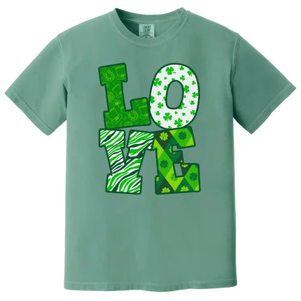 Green St. Patrick’s Day LOVE t-shirt flat lay showcasing bold holiday patterns and eye-catching festive design