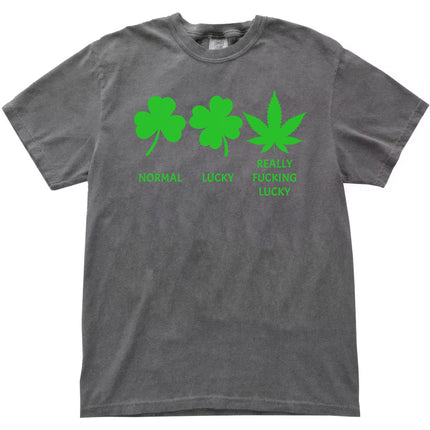Gray St. Patrick’s Day funny luck t-shirt flat lay with shamrock, four-leaf clover, and weed leaf graphic