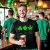 Male model wearing black “Really Fucking Lucky” marijuana leaf St. Patrick’s Day t-shirt standing at a bar celebrating with drinks