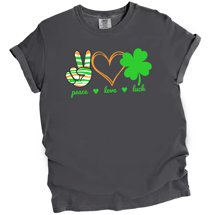 Gray Peace, Love, Luck St. Patrick’s Day t-shirt flat lay highlighting colorful peace sign, hearts, and four-leaf clover design