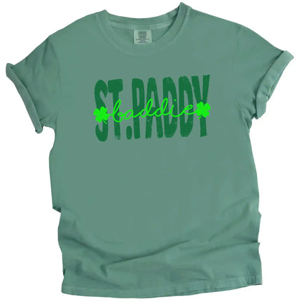 Green St. Patrick’s Day St. Paddy Baddie t-shirt flat lay featuring bold mixed-font lettering in festive green tones