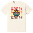Cream colored Thanksgiving t-shirt featuring ‘Talk Turkey to Me’ text with playful turkey wearing sunglasses and big muscles graphic for festive fall apparel.