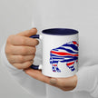 Hand holding white Buffalo football coffee mug featuring ‘The Mafia Runs Buffalo’ design with red white and blue buffalo silhouette, sports fan drinkware for game day use.