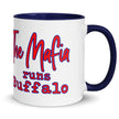 Right side view of white Buffalo football coffee mug with partial ‘The Mafia Runs Buffalo’ lettering and red white and blue buffalo silhouette design.