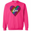 Hot pink sweatshirt featuring colorful animal print heart, white “Love” text, bright studio flat lay