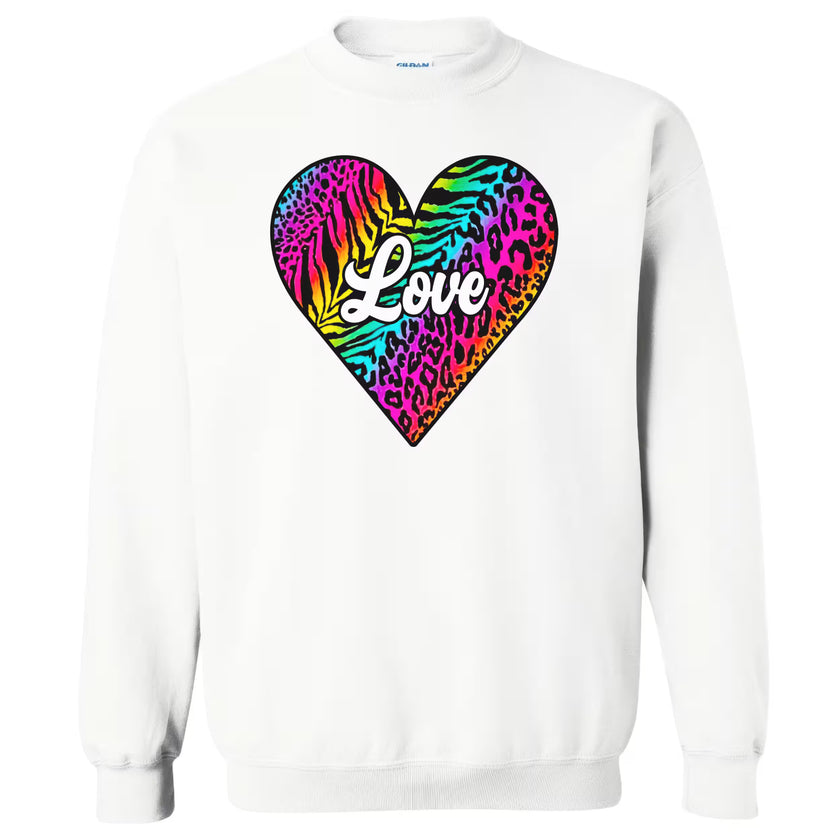 White sweatshirt flat lay with bold rainbow print heart and crisp white “Love” lettering