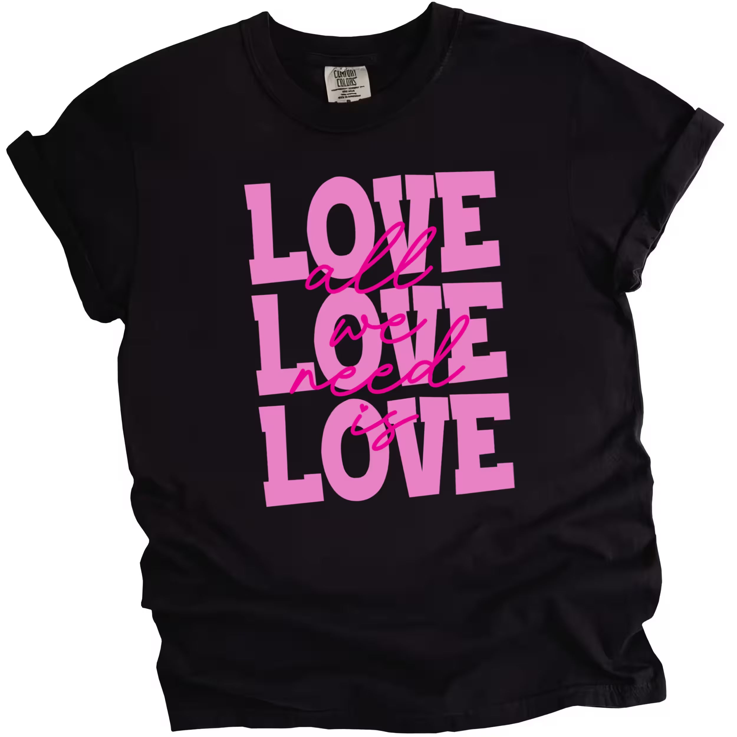 Black Valentine’s tee with ‘All We Need Is Love’ pink lettering, styled flat lay for bold, cute vibes