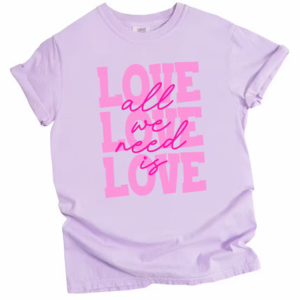 Light purple Valentine’s shirt featuring pink script and block lettering, flat lay for cozy, cute outfit inspiration