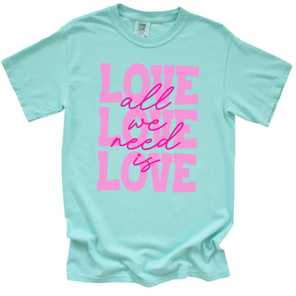 Mint ‘All We Need Is Love’ Valentine’s tee with playful pink script and heart, flat lay for romantic gift ideas