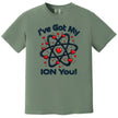 Green science pun Valentine shirt flat lay showing atom design and “I’ve Got My Ion You” lettering for nerdy couples.