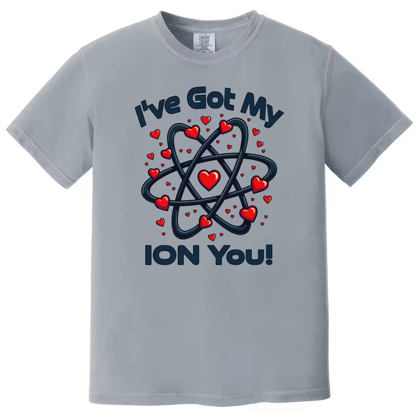 Gray geeky Valentine t-shirt flat lay with playful chemistry pun and atom graphic for science lovers.