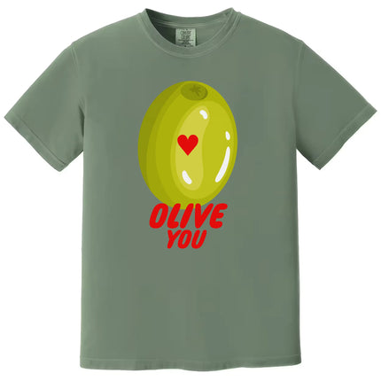 Olive You pun t-shirt flat lay in green, clever Valentine’s Day pun shirt for humor lovers
