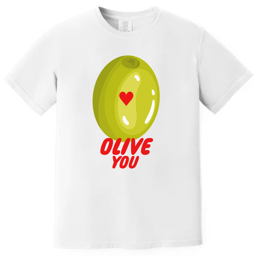 Olive You pun t-shirt flat lay in white, cute Valentine’s Day pun tee with olive and heart