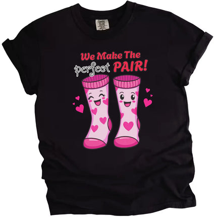 We Make the Perfect Pair Valentine t-shirt, black shirt flat lay, cute love pun sock graphic, unisex Valentine’s Day tee for couples and gifts