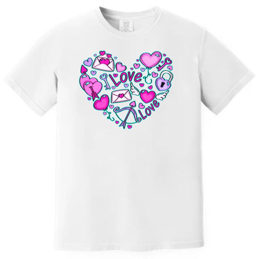 White shirt flat lay on white background featuring playful Valentine’s doodle heart with cupid arrows and love notes.
