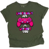 Green “Emotionally AFK” Valentine’s tee with hot pink game controller, flat lay from above on white surface.
