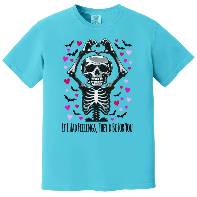 Blue shirt flat lay with skeleton hands forming a heart above his head, surrounded by black bats and hearts.