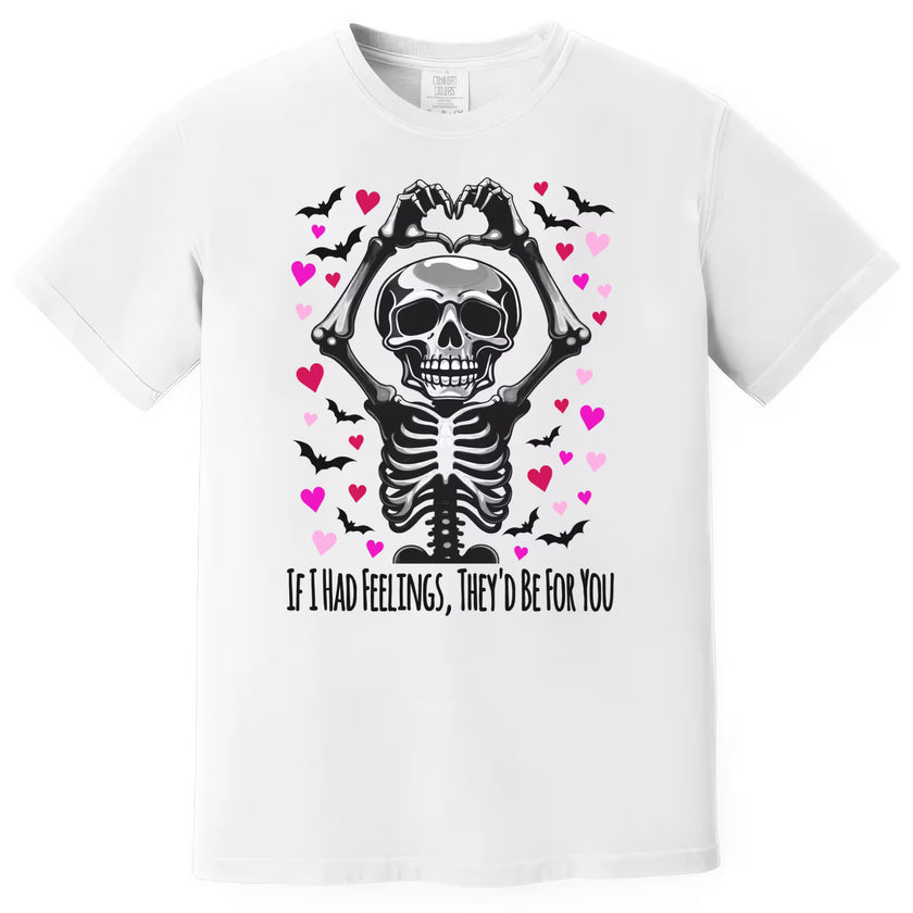 White shirt flat lay showing Gothic Valentine design with skeleton heart hands and pink/red heart accents.