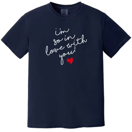 Navy blue “I’m So In Love With You” graphic tee with white script lettering and red heart, cozy romantic style for Valentine’s Day or everyday wear